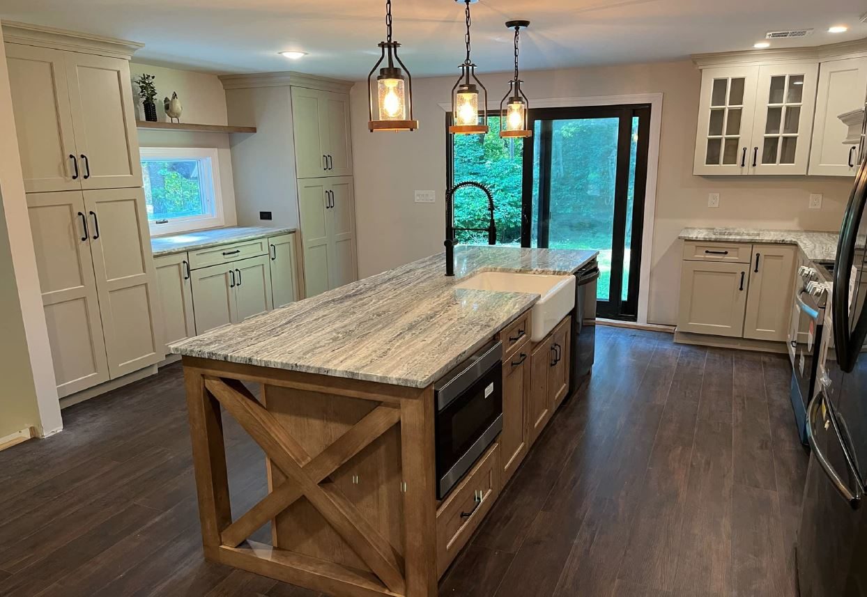 Kitchen with a custom island and quartz counters